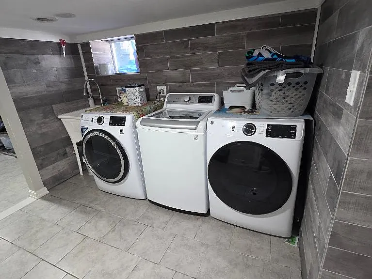 Washer and dryer located in basement provided for tenant to use