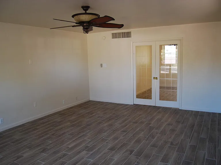 Spacious living room with pocket doors