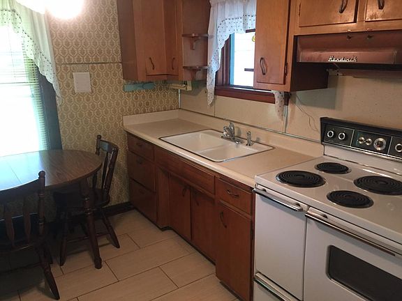 Kitchen with Appliances - New Fridge, Oversized Electric Stove