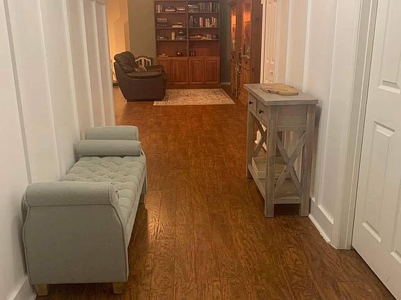 Entrance with bonus room and hall closet