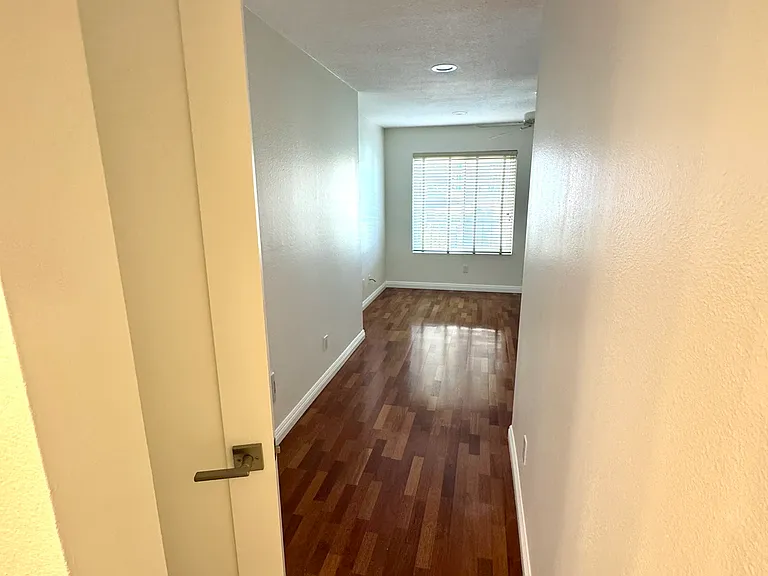 Entrance to primary bedroom and primary bathroom.
