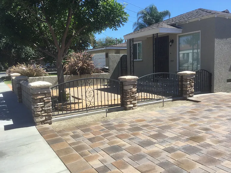 Front entry with patio and tree