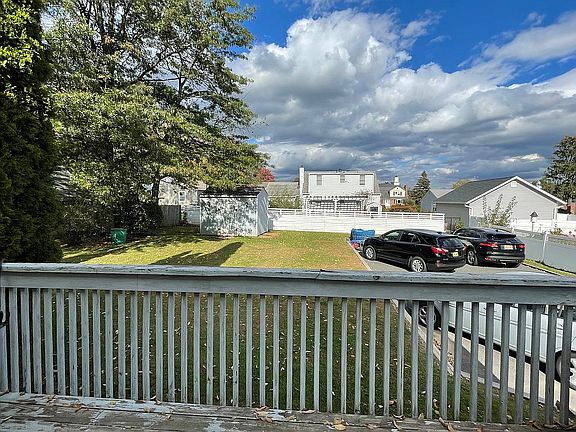 Backyard w/ shed & driveway