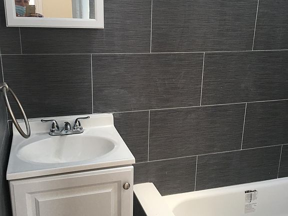 Newly renovated bathroom, with all new fixtures and millwork.