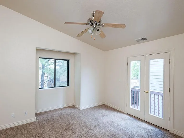 Primary Bedroom with balcony