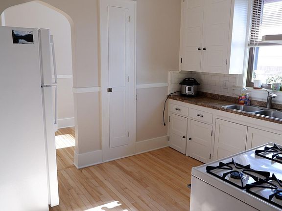 Kitchen with new fridge.