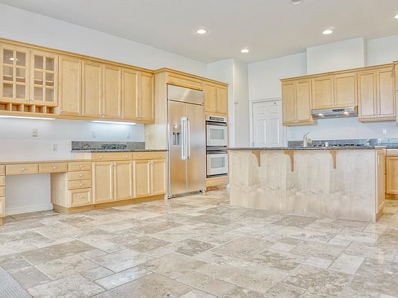 Spacious kitchen including desk