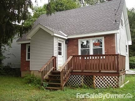 Front
						:
						Note deck, brick. New Roof and Siding.