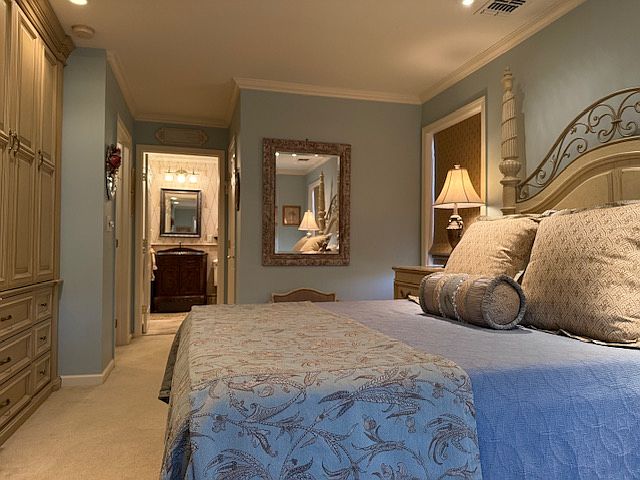 designer decorated with hi-end finishes and custom drapes and blinds