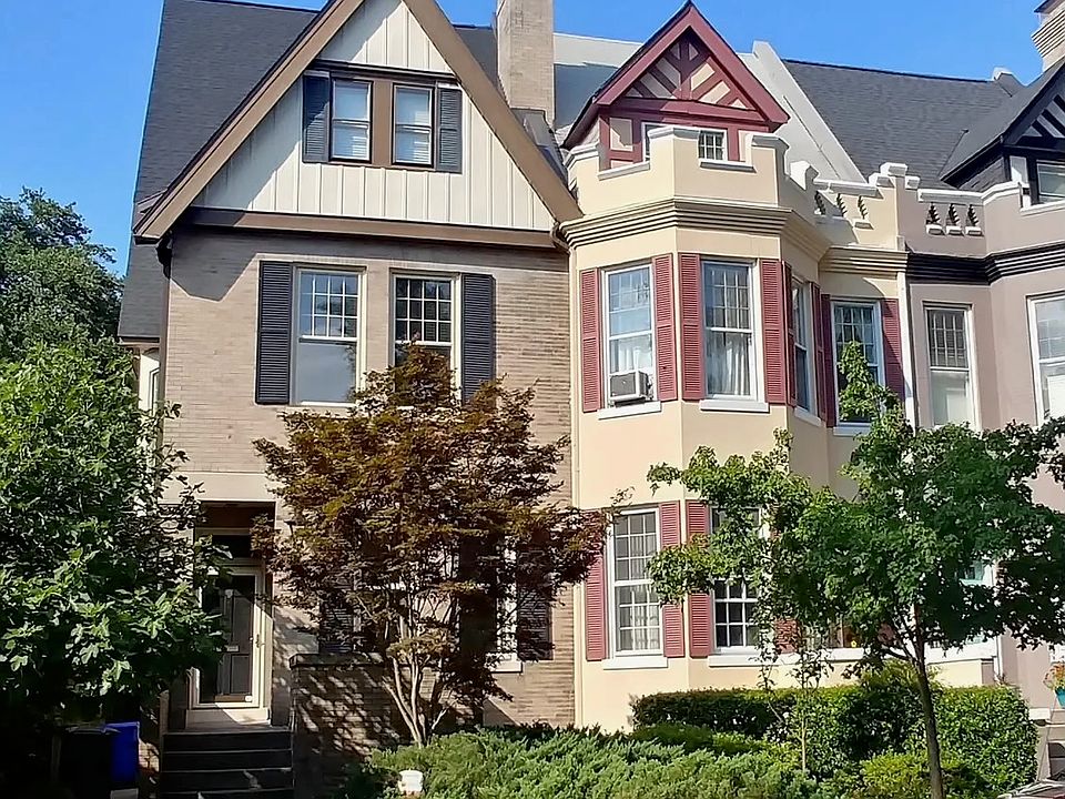 Front of house (dark blue shutters)