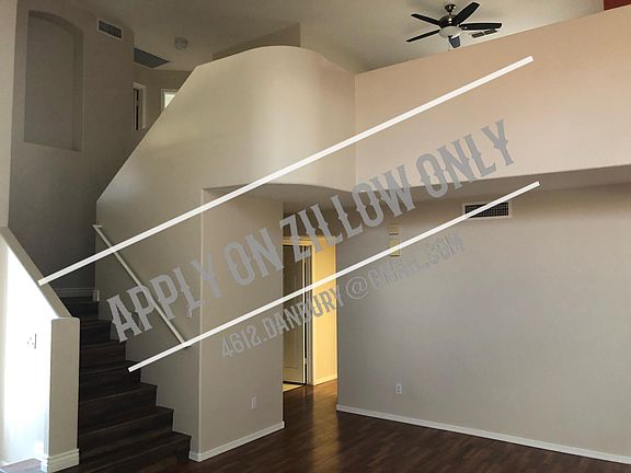 Great Room / Living Area / Looking from front door to garage entrance and kitchen entrance