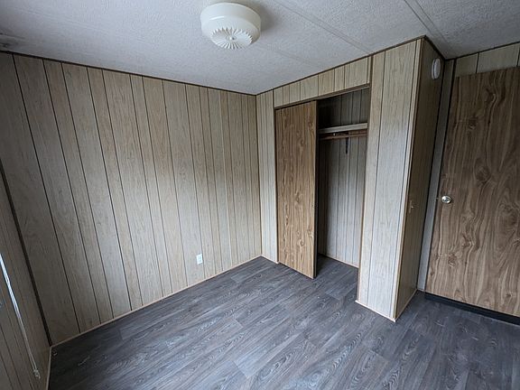 First bedroom off of the hallway.