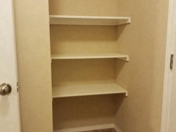 Built-in shelves in utility room 