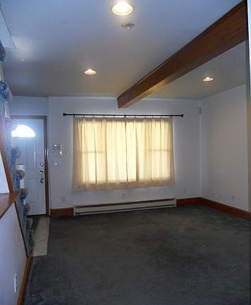 Living Room w/recessed lights & decorative beam!