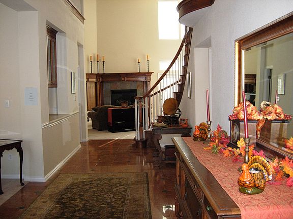 Majestic entry w/ high ceilings, marble flooring