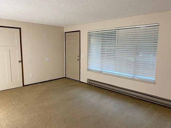 Living room with entry and coat closet