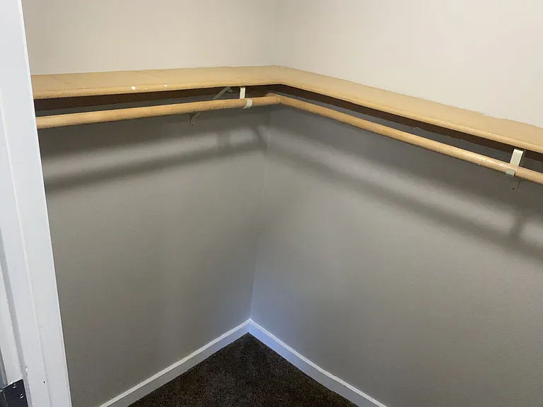 Large closet offering plenty of room for all your wardrobe essentials