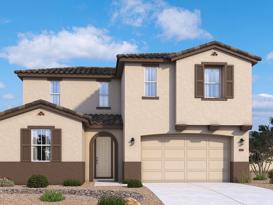 Spanish-style two-story Pleasant home exterior with warm stucco and rich arched architectural detail