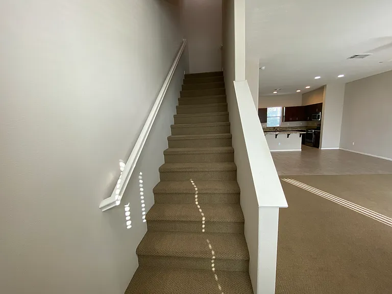 stairs to 3rd floor bedrooms.