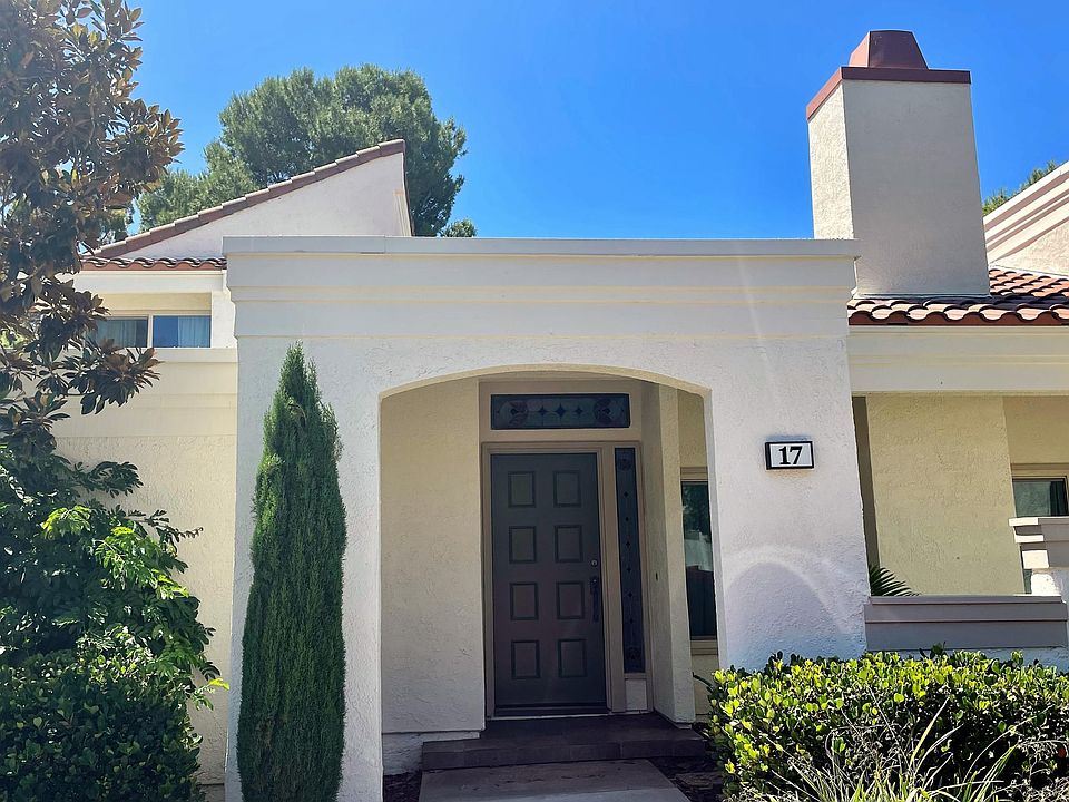 Front door with private entry patio to the right.