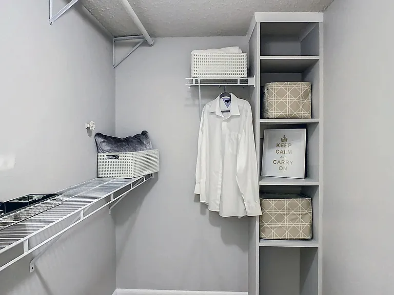 Embrace organized living with our expansive walk-in closet and built-in storage solutions.