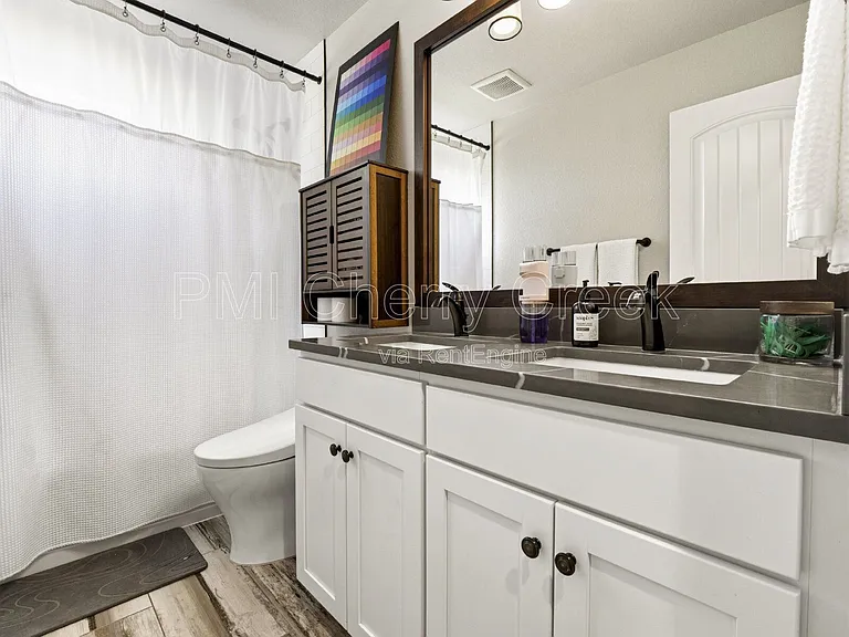 5988 N Fulton St — Photo 14