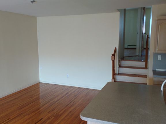 living room, wall opposite windows