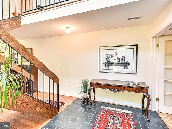 Light pours into your two story Foyer