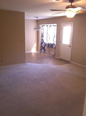 Family room looking into breakfast area and back door.