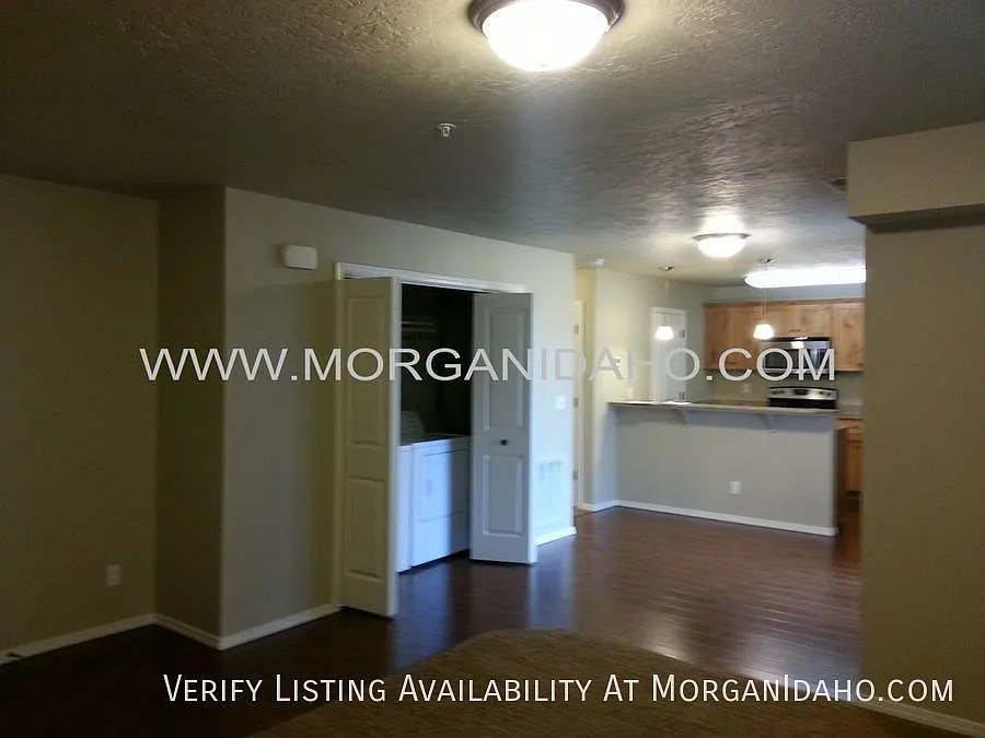Covered parking, storage/patio, granite counters, and more! — Photo 3