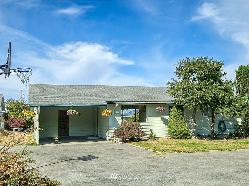 Enter from the carport to the open floor plan. Plenty of parking.