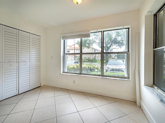 5th image of 3480 Pinewalk Dr N APT 116