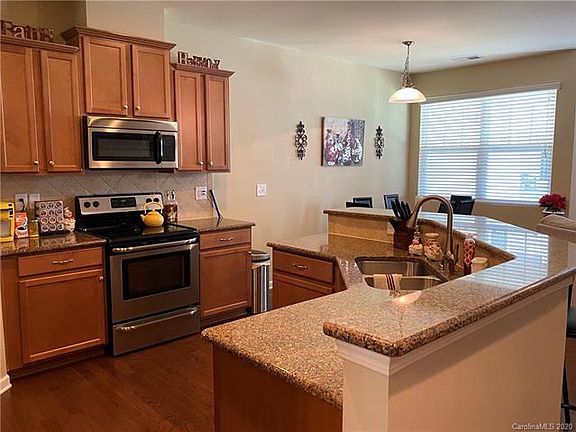 5th image of 7030 Woodsbay Ln