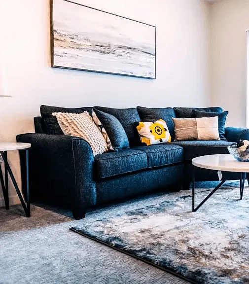 Large couch in a unit at Heartland Flats North Platte.