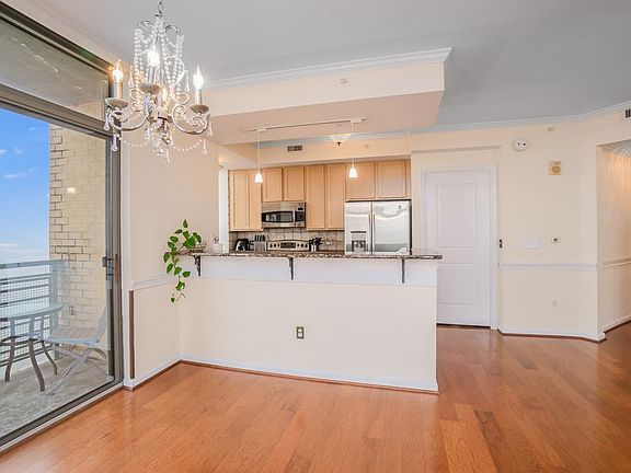 Spacious Kitchen includes SS Appliances, ample cabinet space, desk for working at home.