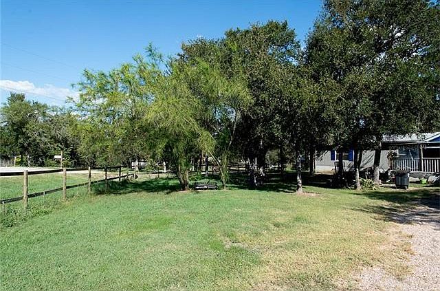 105 Oak Grove Circle from the front gate.