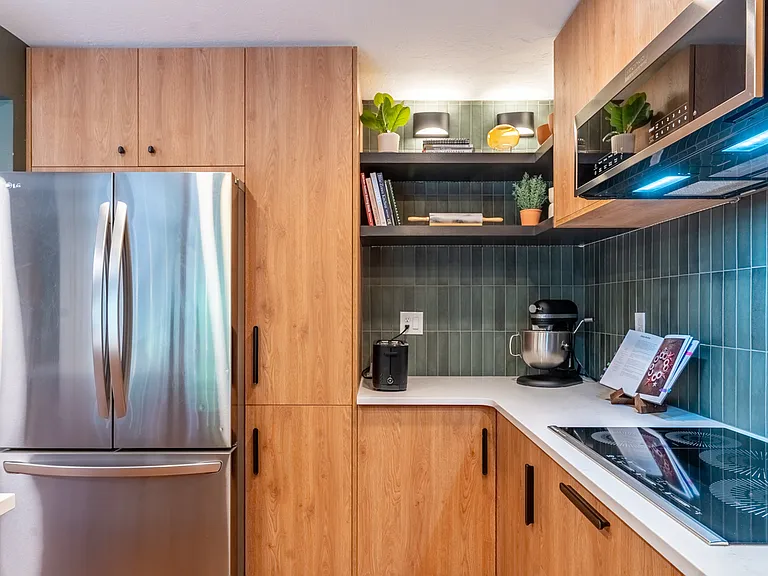 Custom Kitchen with double ovens and induction stove
