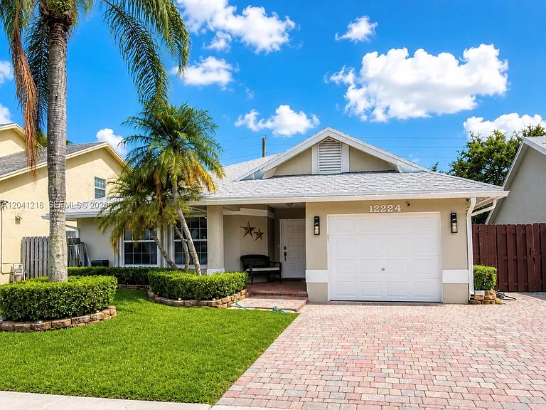 12224 NW 30th Mnr — Photo 1