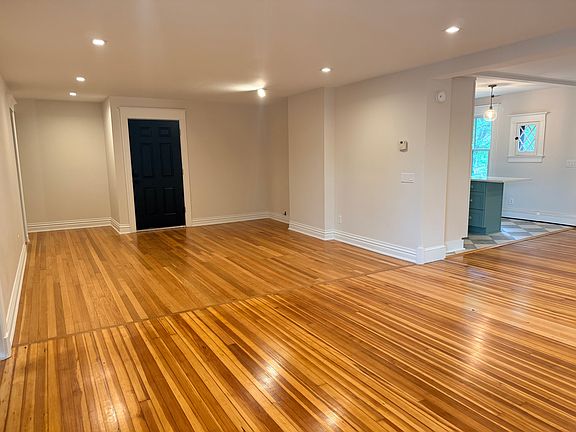 View from sitting area to living room area