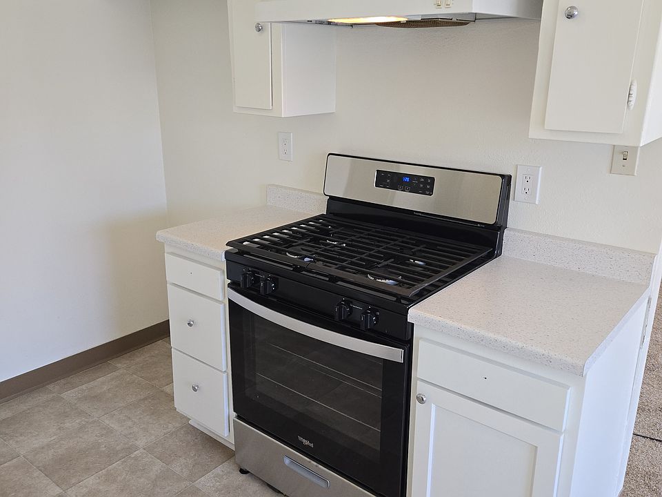 New stainless gas stove and lower cabinets and counter