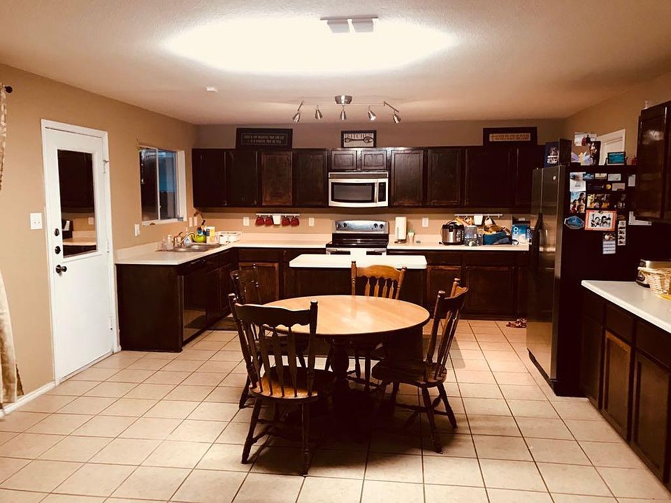 Island Kitchen with Lighted Cabinets