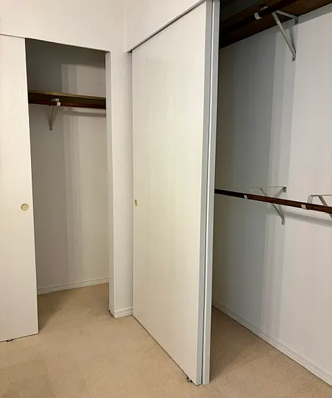 Master bed has two closets