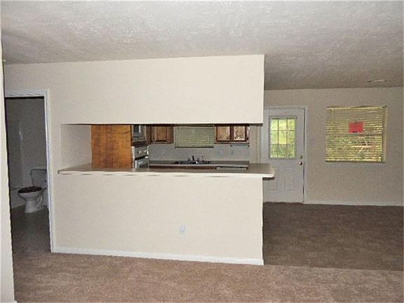 KITCHEN OPEN TO LIVING ROOM