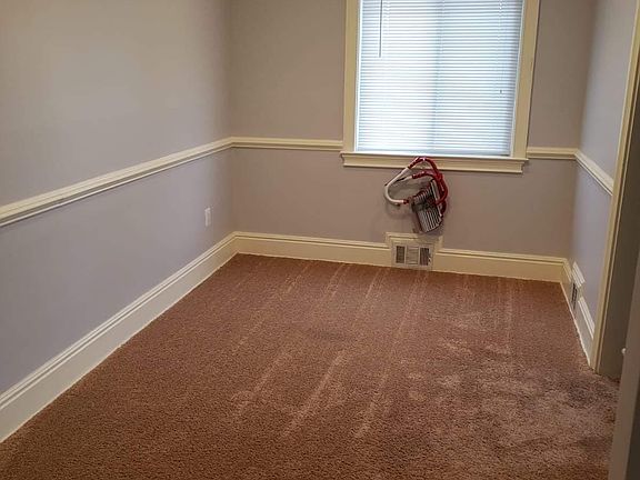 Dining room, carpet throughout.