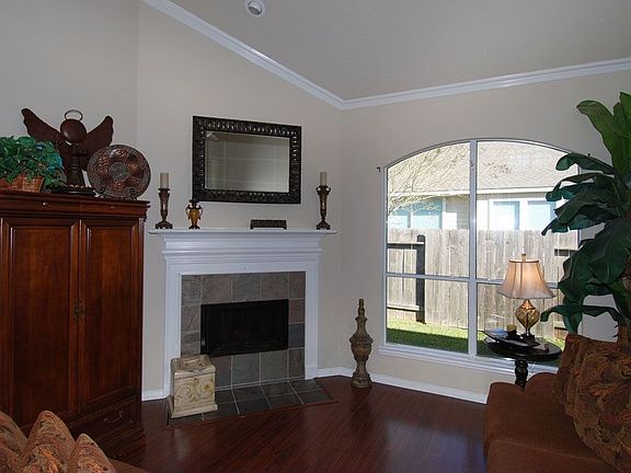Lush wood flooring in the family room, creating a nice warm cozy feel!