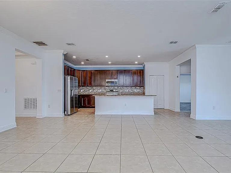 Note: Kitchen accent wall has since been professionally repainted to match the updated interior color scheme. Updated photos coming soon.