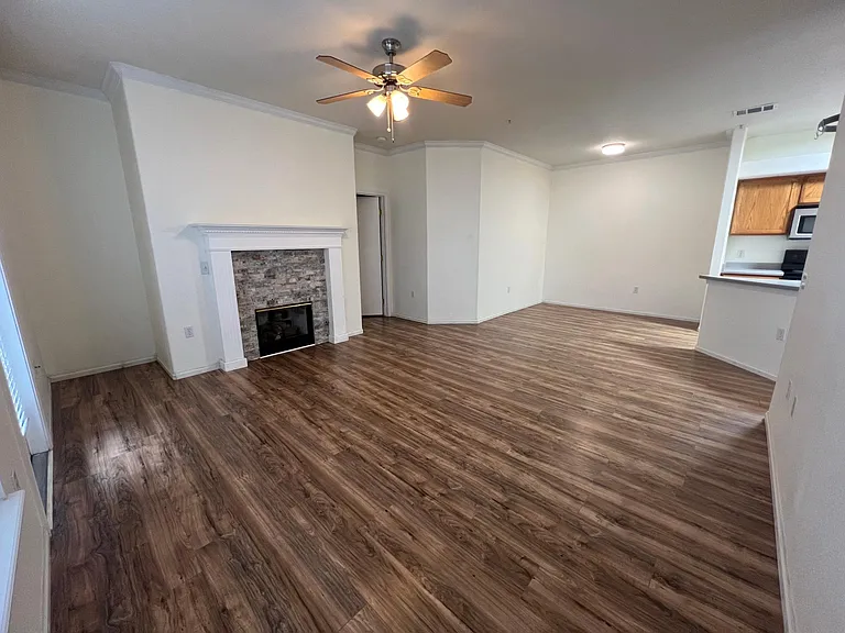 Large living space with a dining room area