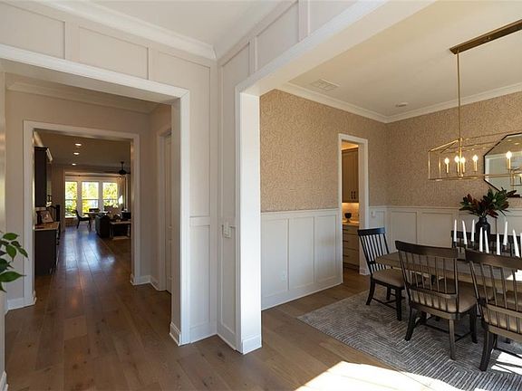 The separate dining room is perfect for Sunday dinners and holiday gatherings. Not actual home. Phot