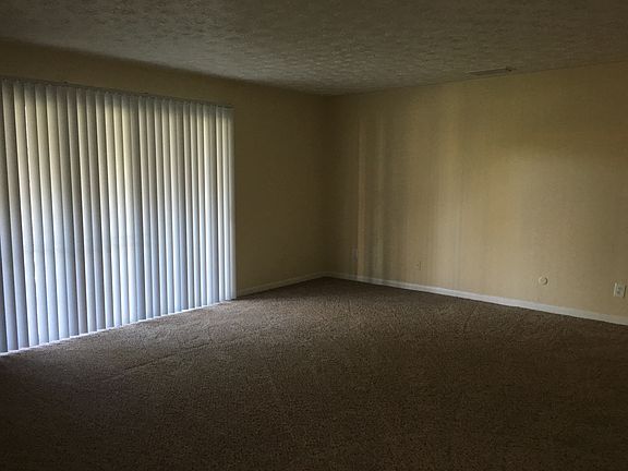 Large Living room with back patio