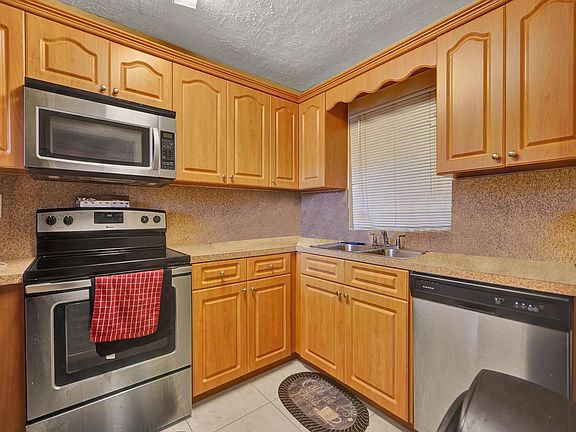 4th image of 9430 Tangerine Place #306